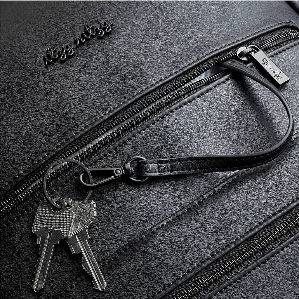 Itzy Ritzy Eras Backpack™ Diaper Bag: Cognac