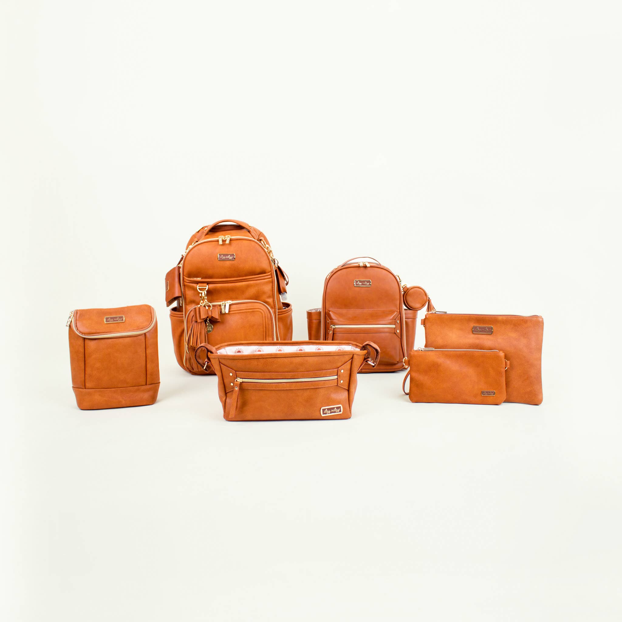 Itzy Ritzy Boss Changing Clutch™ Cognac