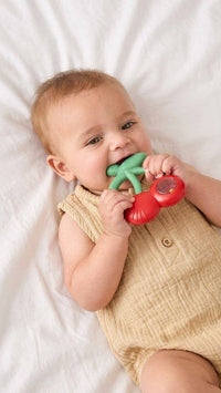 Itzy Ritzy Bitzy Shake™ Silicone Teether with Rattle