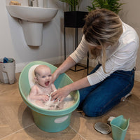 Nattou & Shnuggle Baby Bathtime Essentials Bundle | Newborn Baby Bath with Support, Rinse Jug, and Ellie Bath Toy Scoop - Taupe