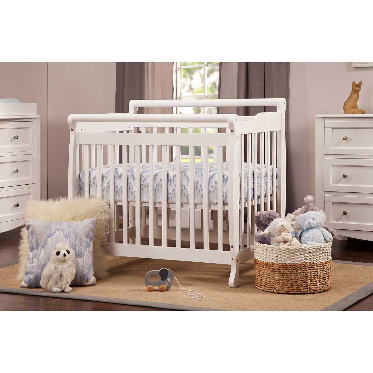 DaVinci Emily 2 in 1 Mini Crib Twin Bed Storkland Kids Too